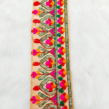Peach Fabric Trim With Green, Fuchsia Pink, Red And Orange Embroidery and Gold Sequins